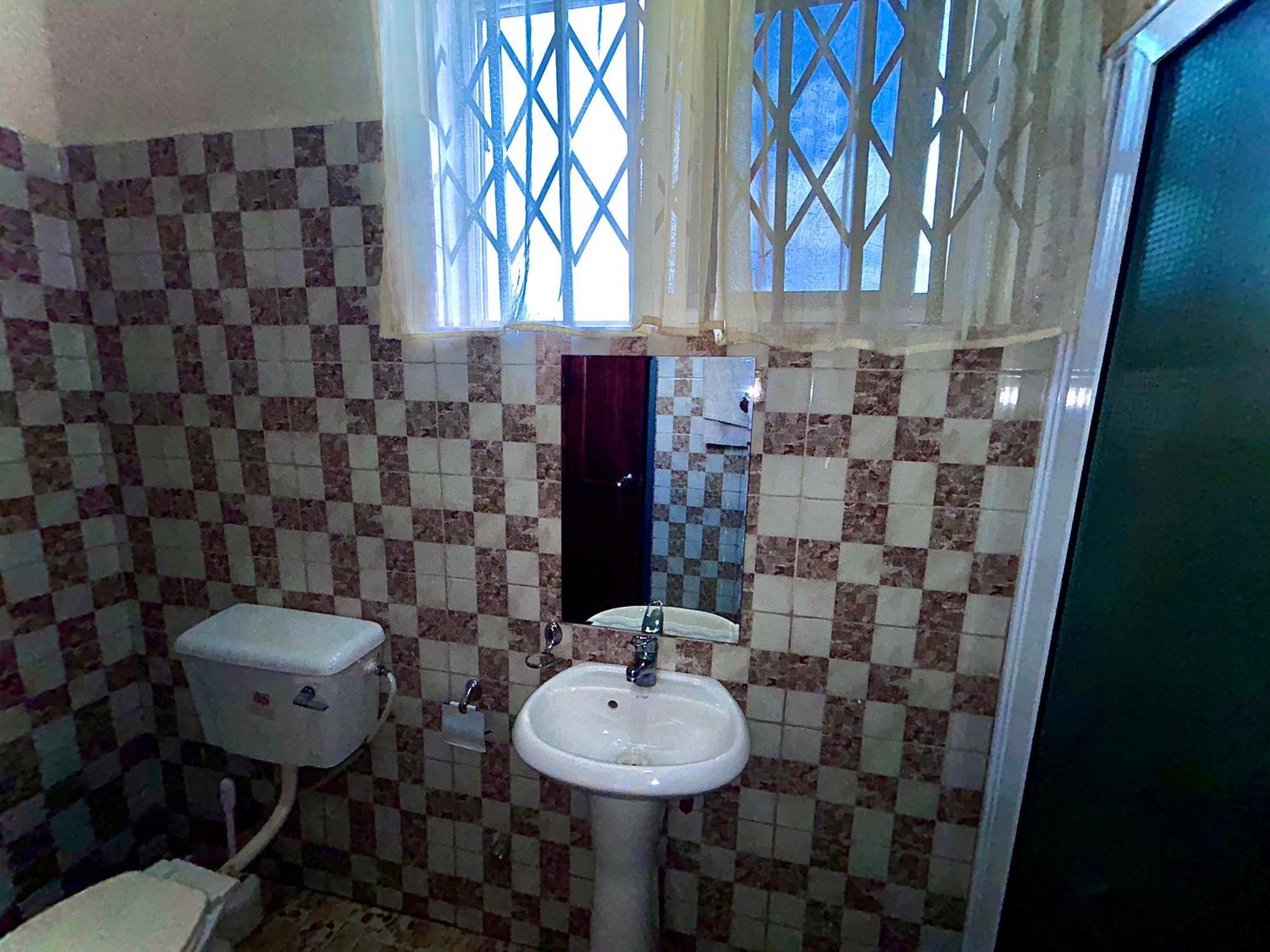Jessie Hotel Adenta Kamer foto